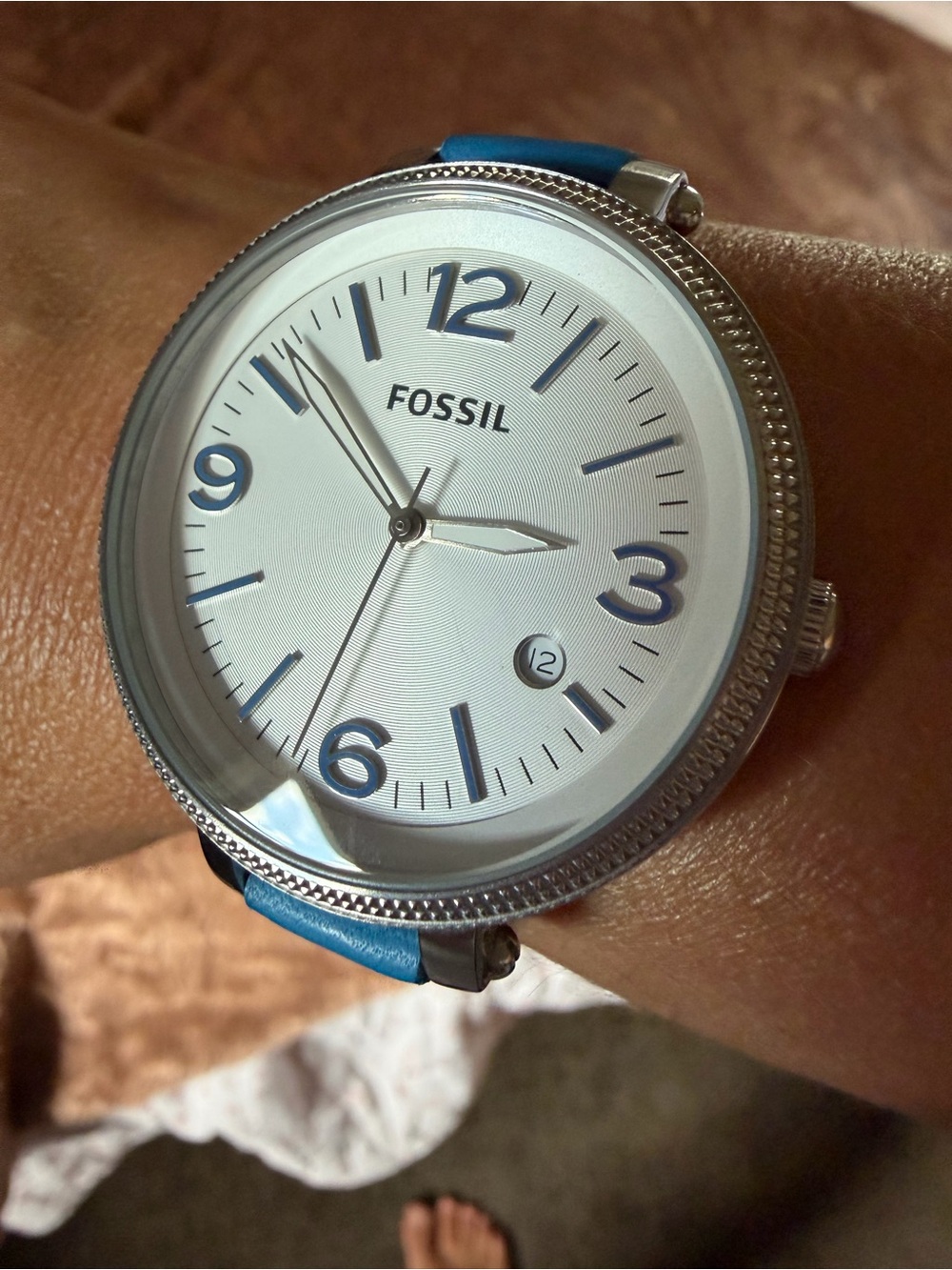 Fossil Silver Dial Watch with Blue Strap and Accents